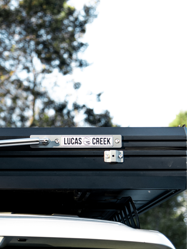 Close up photo of the Lucas Creek logo on the gas strut bracket